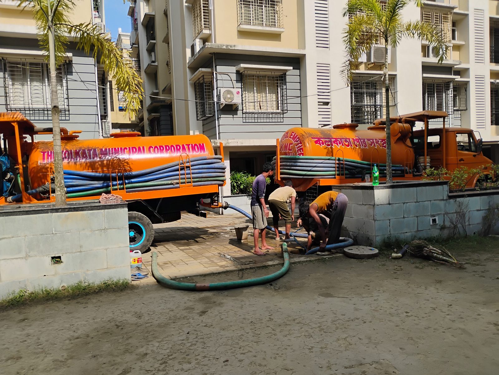 A cesspool tanker on site for a tank emptying job in Kolkata