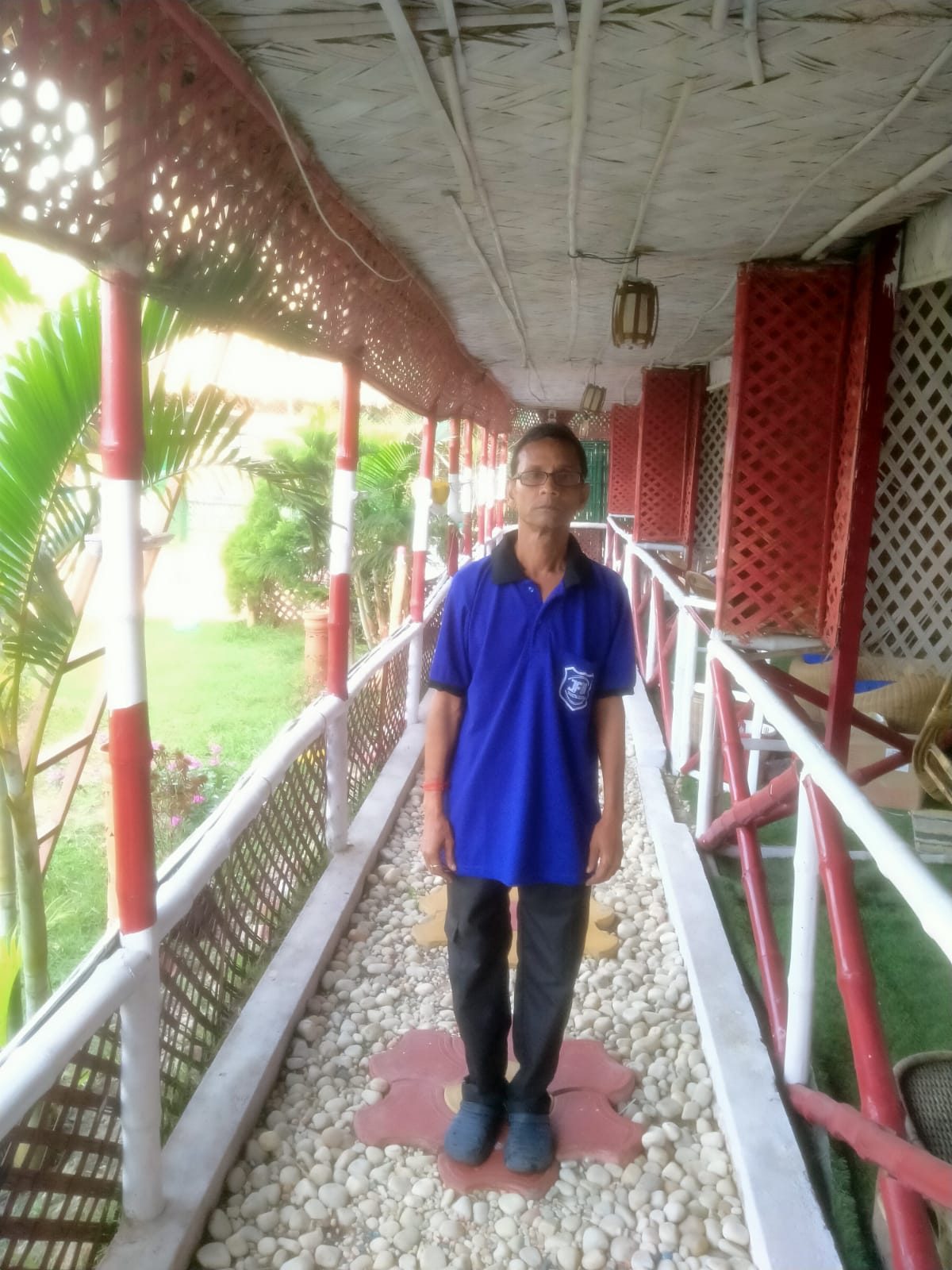 Housekeeping staff on a walkway at a resort property