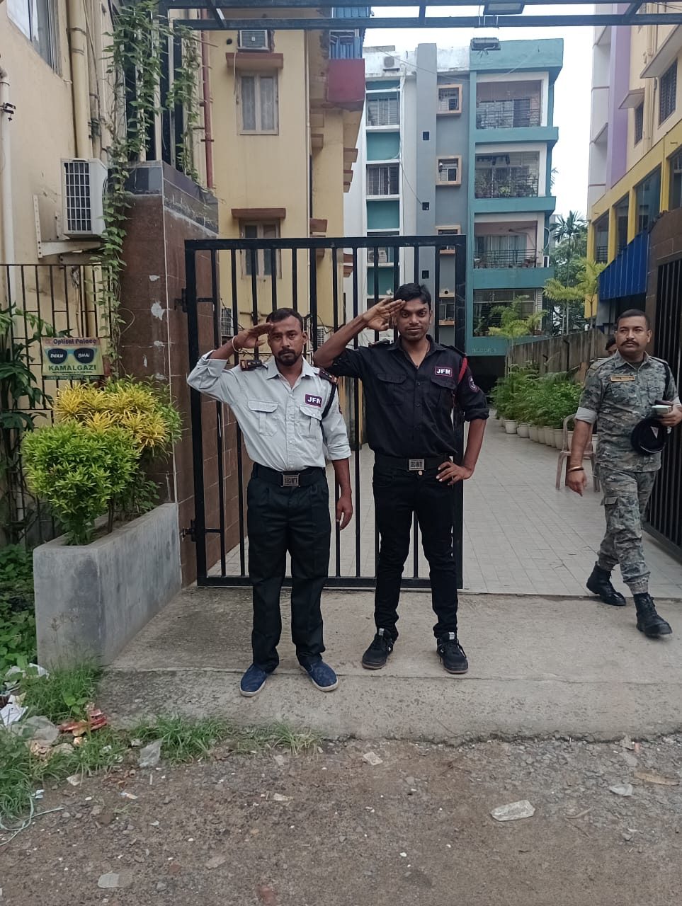 Guards checking entry at a site gate