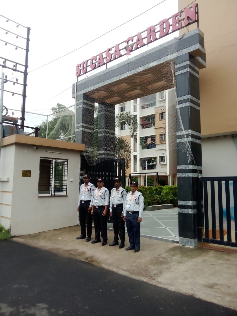 Guards on duty outside an apartment building
