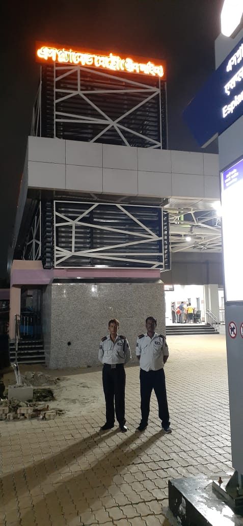 A guard on duty at a railway premises entrance